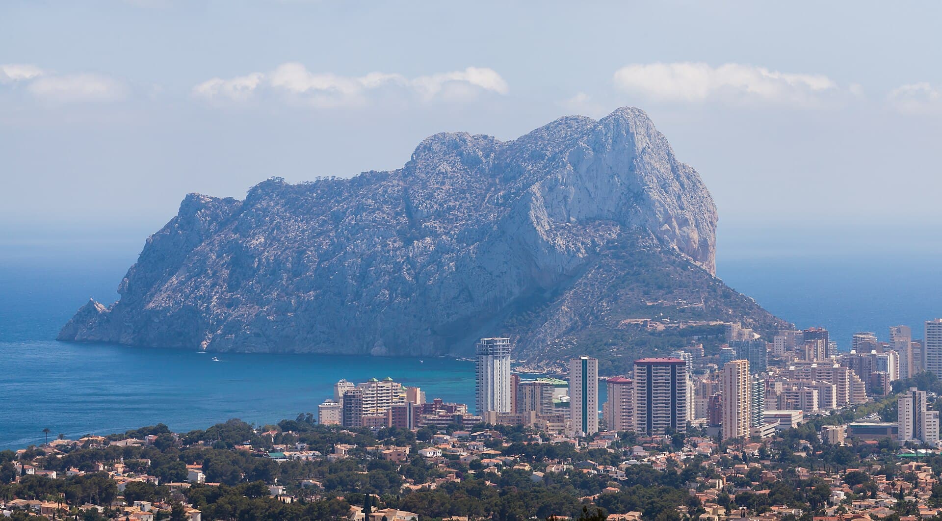 The Peñón de Ifach rising behind the apartment towers of Calpe