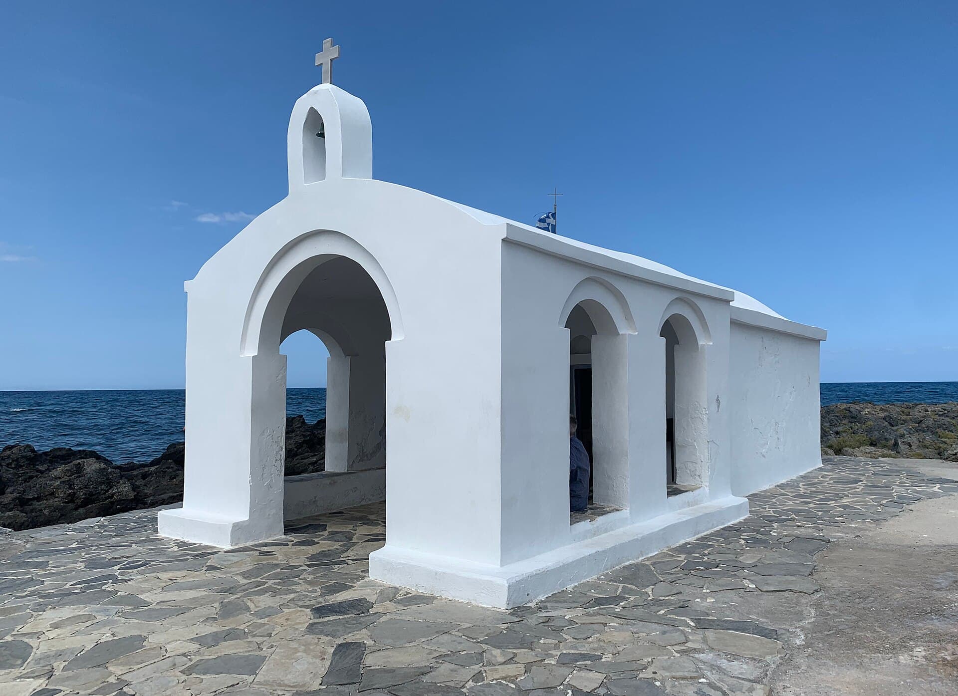 The whitewashed chapel of Agios Nikolaos by the sea at Georgioupolis