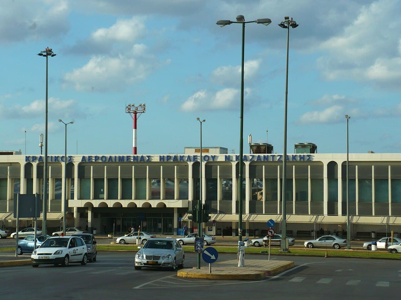 Cars parked in front of the terminal building at Heraklion Airport