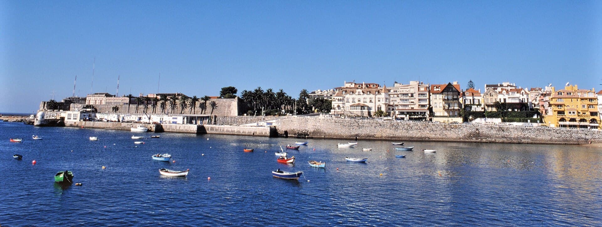 Small boats moored in the bay at Cascais