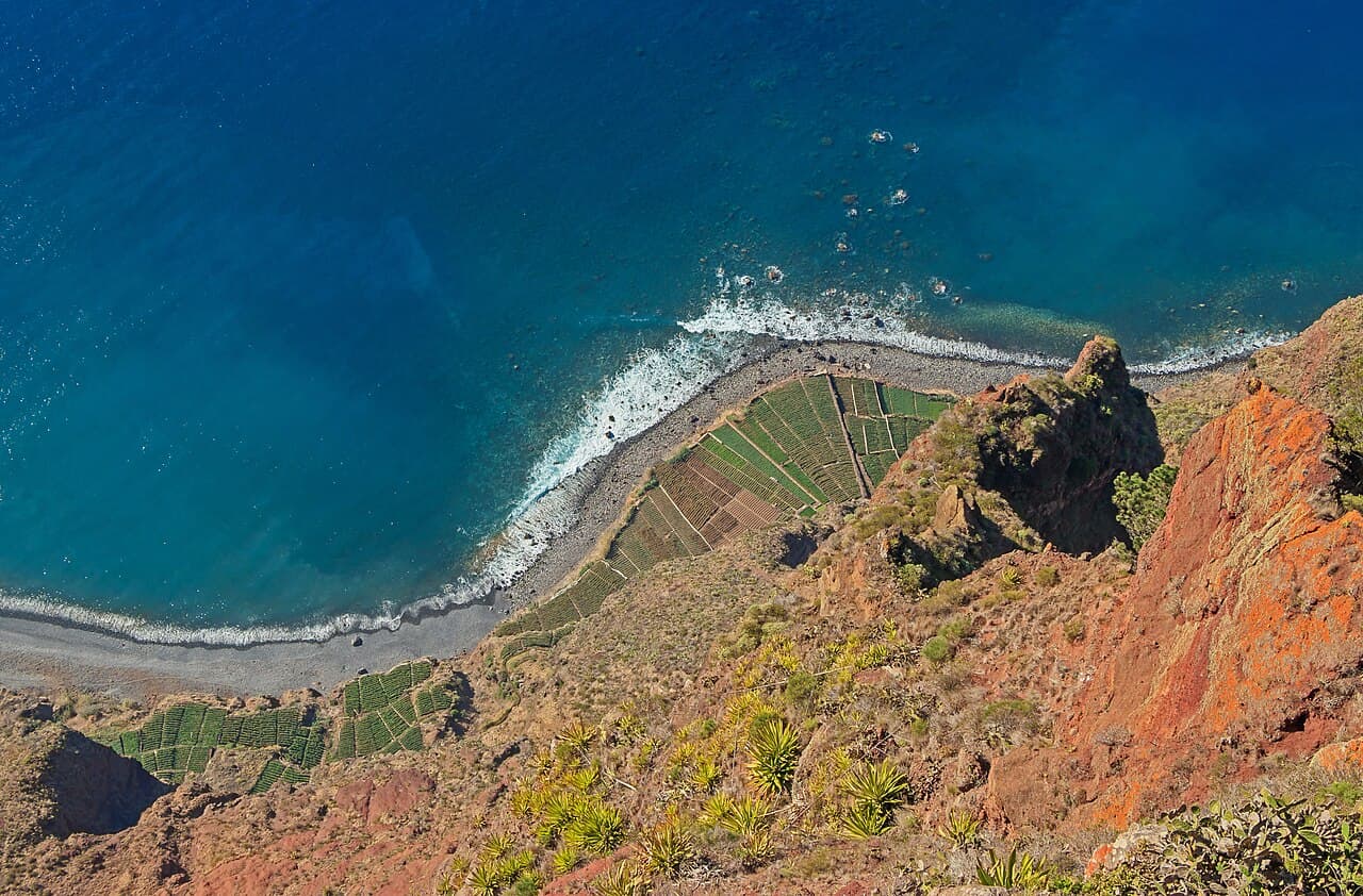 The view down from Cabo Girão to terraced fields and the Atlantic