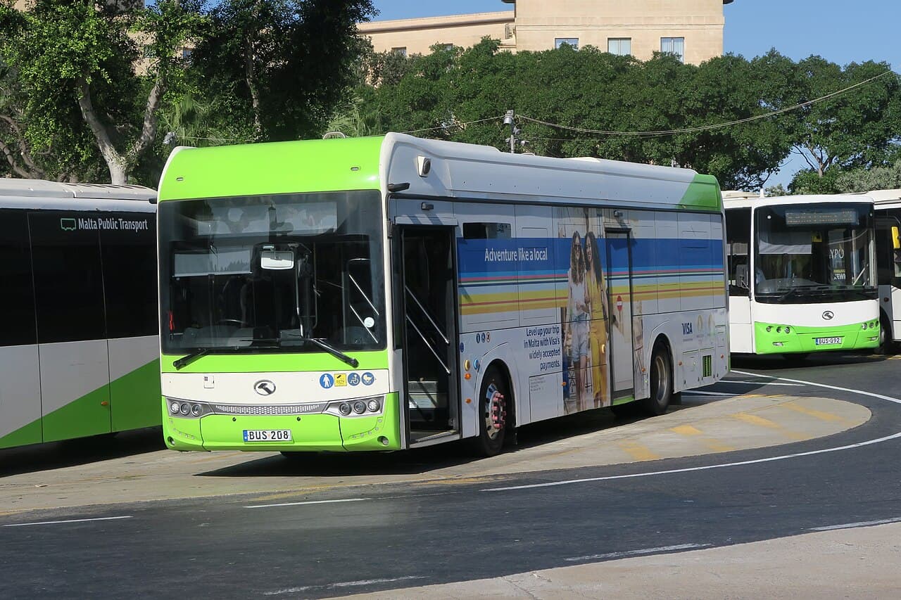 A Malta Public Transport city bus at a stop
