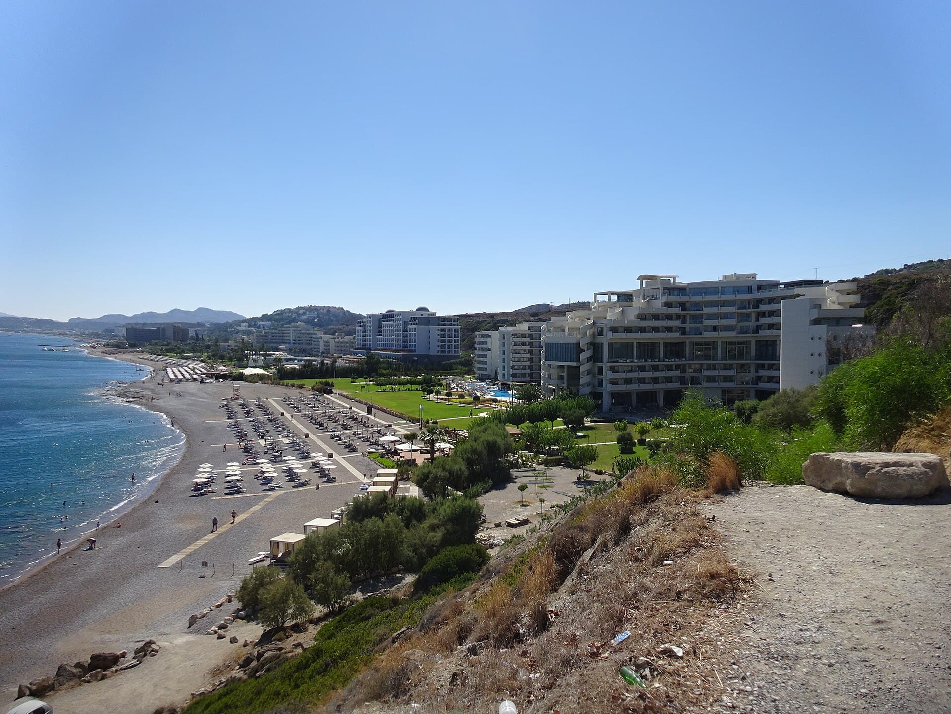 The beach at Faliraki with hotels along the shore