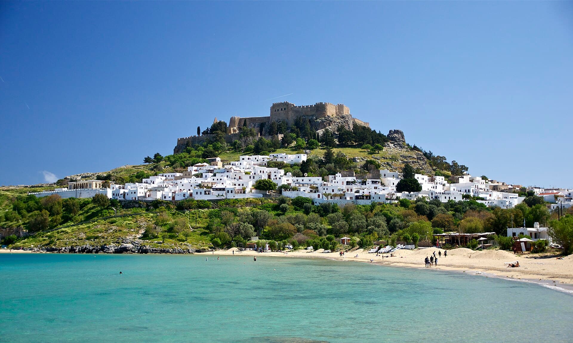 Lindos on Rhodes, with its acropolis above the white village and the bay below