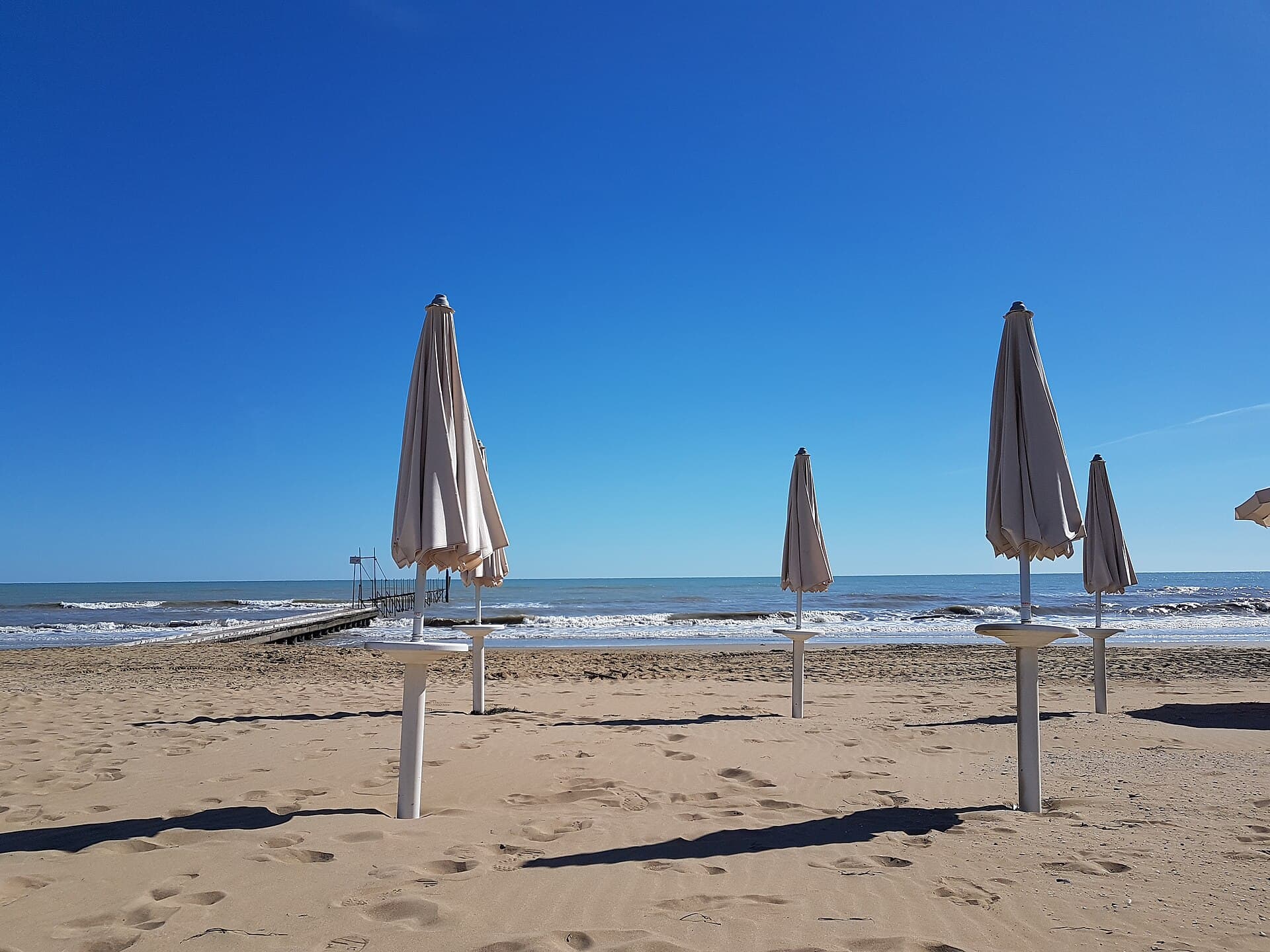 Parasols on the Adriatic sand at Lido di Jesolo