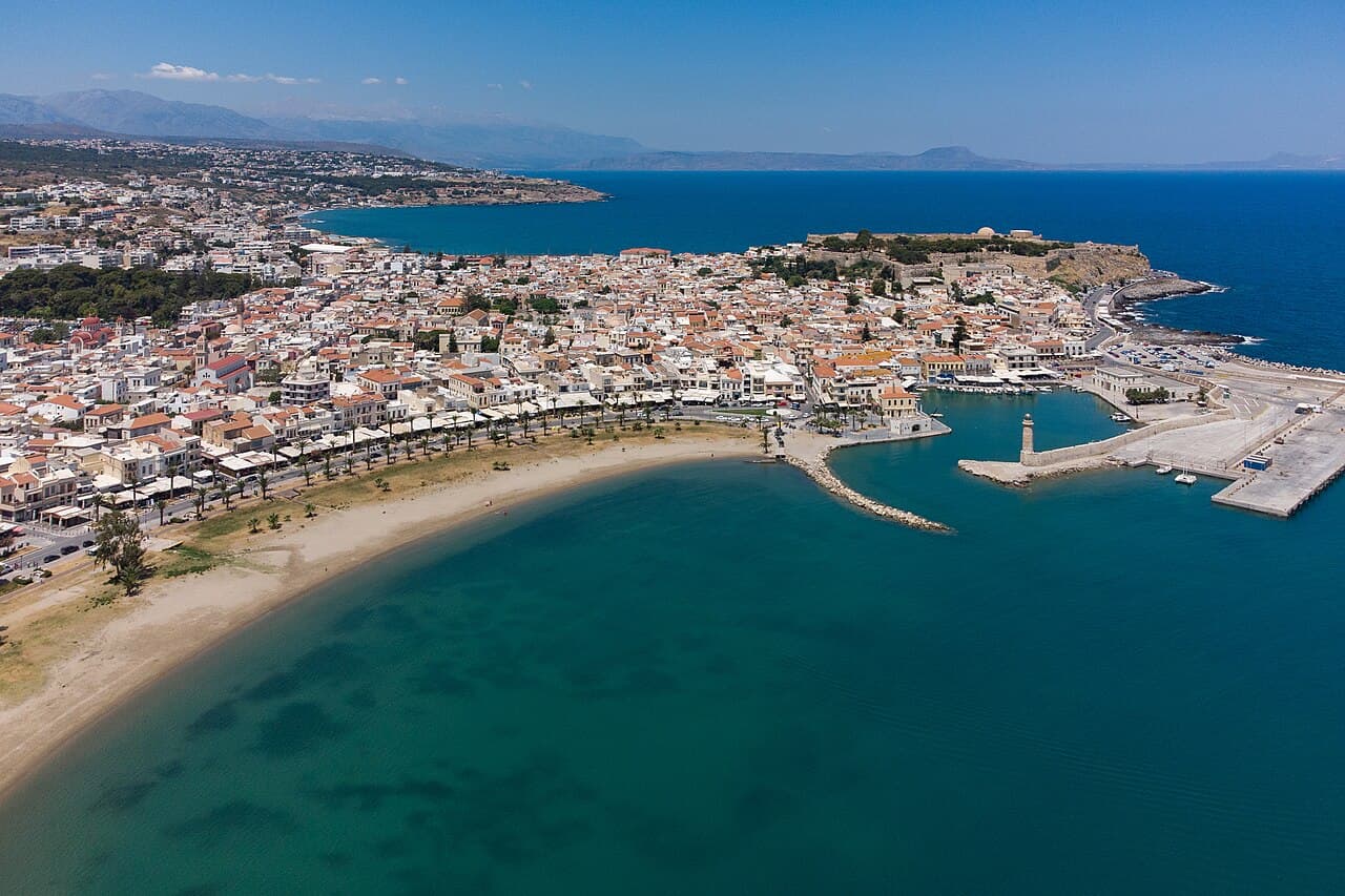 Aerial view of Rethymno’s old town and harbour, with the Fortezza on its headland