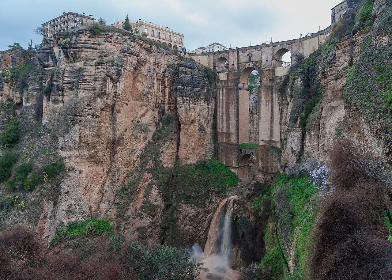 The Puente Nuevo spanning the El Tajo gorge in Ronda, with a waterfall below