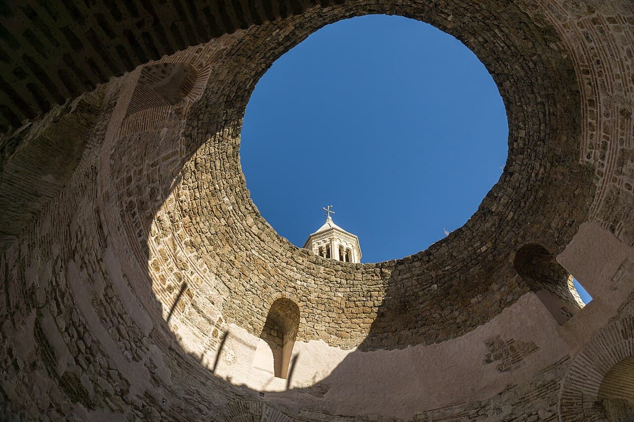 The cathedral bell tower seen through the open dome of the Vestibule in Diocletian’s Palace