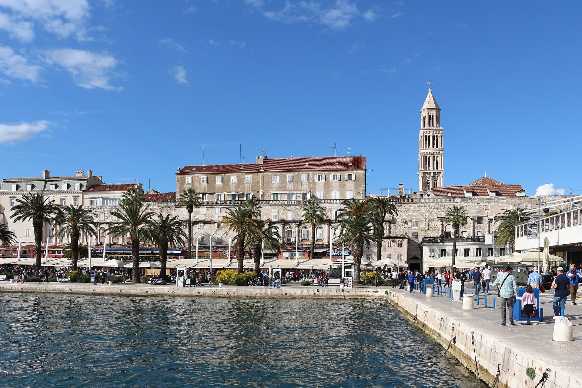 The Riva waterfront in Split, with the cathedral bell tower above Diocletian’s Palace