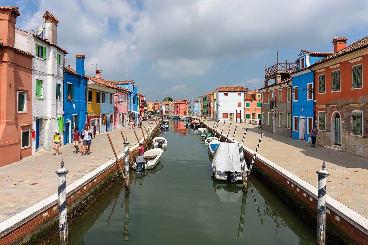 Brightly painted houses along the Rio Giudecca canal on Burano
